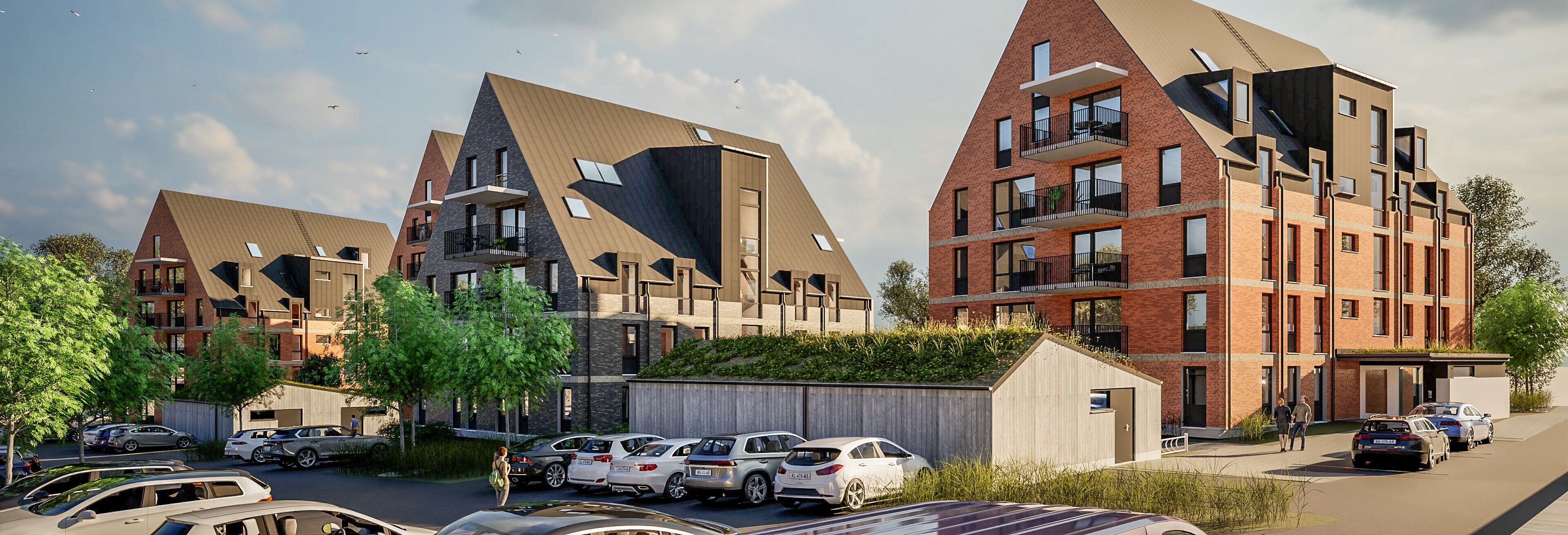 Kvarter med fyra punkthus som är tegelklädda och med mörka plåttak