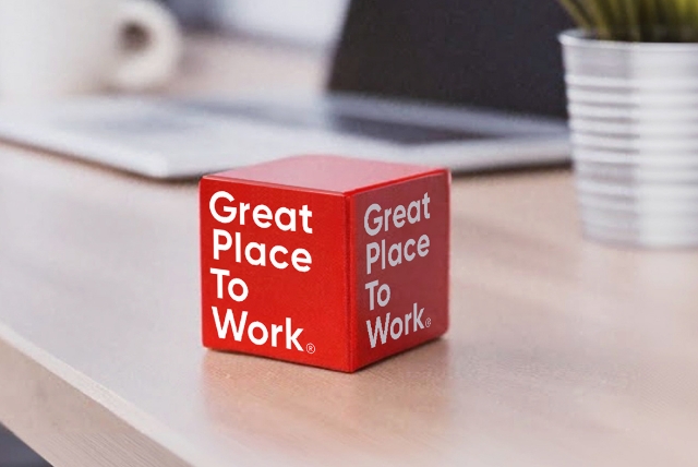 Great Place to work står på en kub 