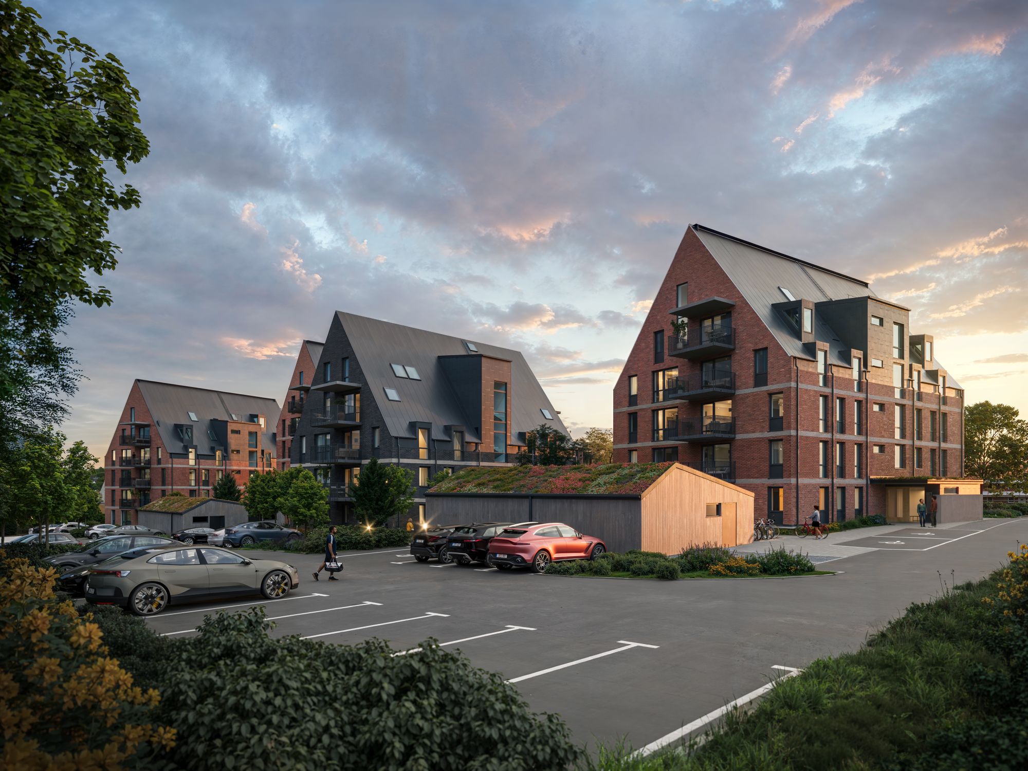 Visionsbild över kvartert i rött tegel och plåttak